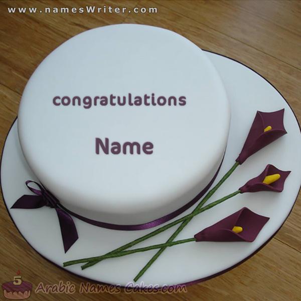 The wonderful cake with cream and bowknot and congratulations