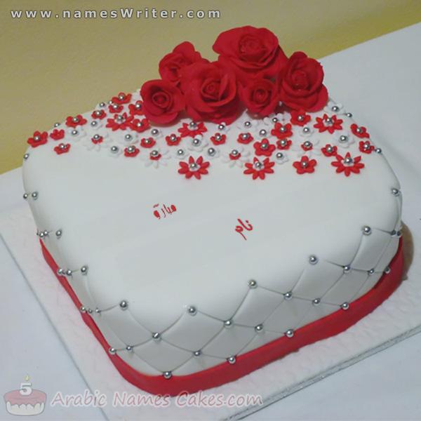 سرخ گلاب اور مبارکباد کے ساتھ تکیہ کیک